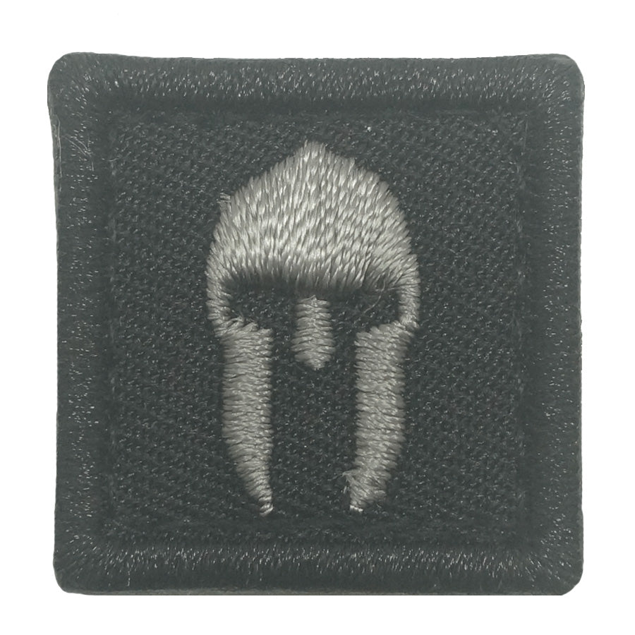 1 MINI SPARTAN HELMET PATCH - BLACK FOLIAGE