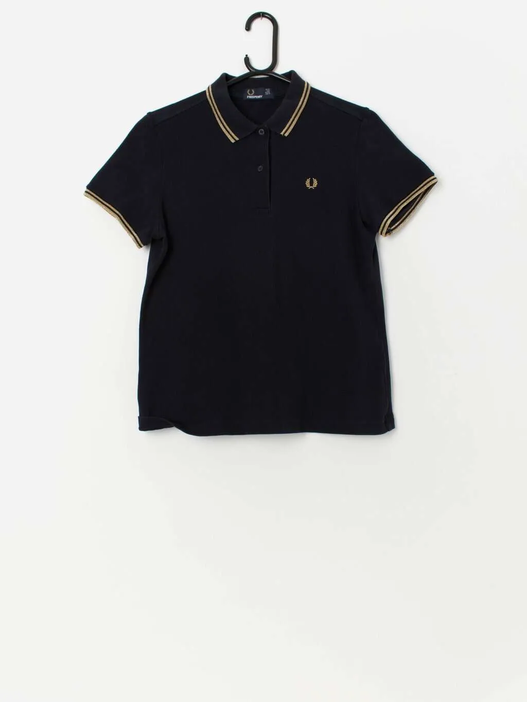 Fred Perry women’s polo shirt in navy with gold trim – Medium / Large